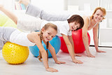Healthy people doing balancing exercise at home