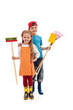 Kids with gardening utensils and rubber boots - isolated