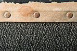 Rivets and leather parts from suitcase