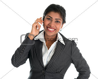 Indian woman talking on phone.