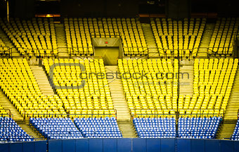Abandoned Empty Stadium Seats in low light 