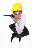 Angry man holding power drill
