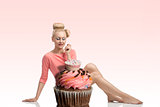 woman with creative look and cupcake
