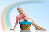 smiling girl with big cupcake