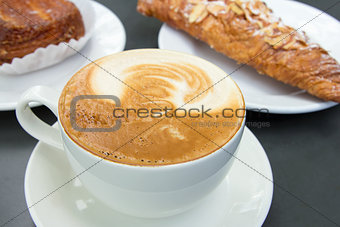 Cup of Caffe Latte with Pastry