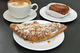 Almond Croissant with Cup of Latte