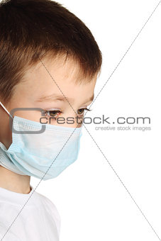 Boy in medicine mask