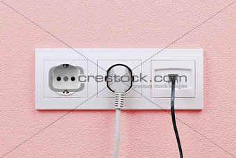 Electric and internet outlets on wall