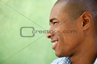 Portrait of happy young black man smiling