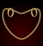 Jewelry two rings on golden chain of heart shape
