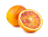 Whole and half red blood oranges