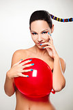 Fashion woman with a red balloon