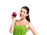 Healthy woman holding an apple