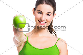 Healthy woman with a green apple