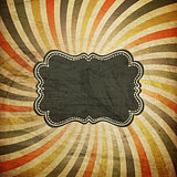 Grunge colorful rays background with vintage label for text. 