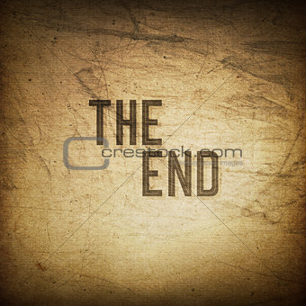 Old cinema phrase (The End...), grunge background