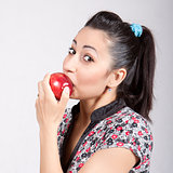woman eat red apple