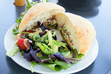 Tuna Salad Sandwich with Ciabatta Bread and Salad Closeup