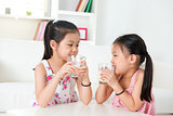 Children drinking milk. 