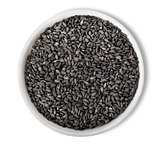 Black sesame in plate isolated