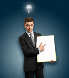 Idea Concept businessman with empty write board