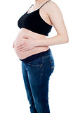 Cropped image of young pregnant woman