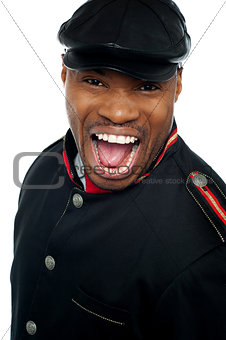 Shouting african man wearing cap