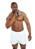 Muscular male drinking health drink