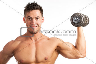 Muscular man lifting a dumbbell over white