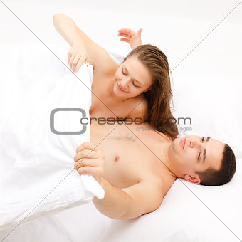 Woman looking at man's private part