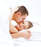 Lover couple in bed