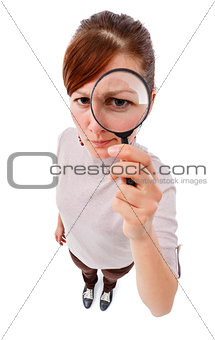 Serious woman as detective with magnifier