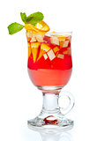 glass of tea with fresh fruits and syrup