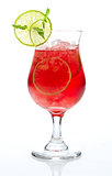 red cocktail with ice and lime
