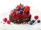 cake with fresh berries and chocolate