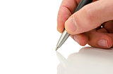 Detail of businessman hand holding a pen