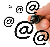 Male hand writing multiple email symbols on a virtual white boar