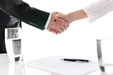 Handshake after signing a contract