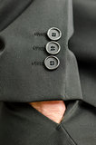 Closeup of manager hand in his pocket