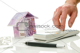 Contractor calculating costs of a house 