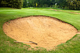 Gold course bunker with rake