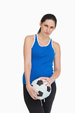 Sportswoman holding a soccer ball
