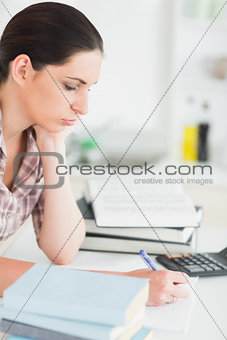 Serious woman studying hard