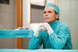 Surgeon sitting in an operation theater