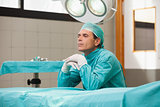 Surgeon sitting in an operating room