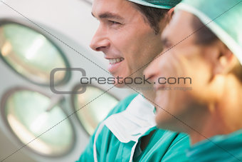 Two surgeons smiling