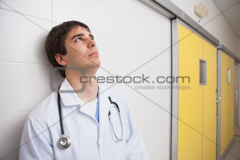Doctor thinks while looking up