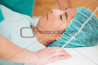Woman sleeping on gurney