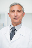 Smiling doctor wearing lab coat