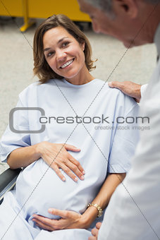 Pregnant woman in wheelchair